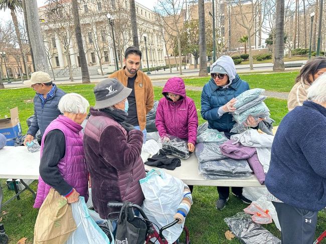 Winter clothing distribution at the park